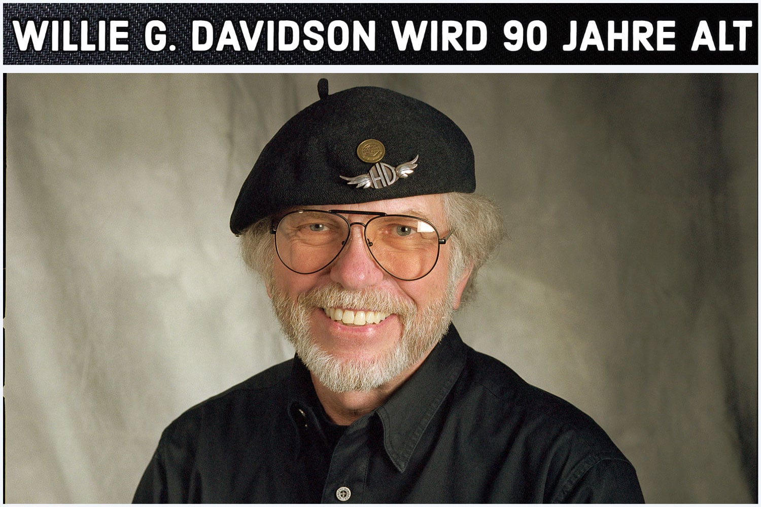 In the photo is Willie G. Davidson from Harley-Davidson