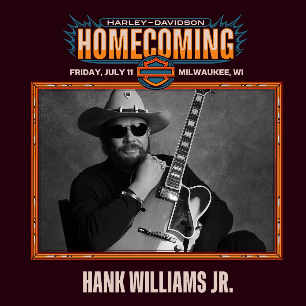 a man holding a guitar