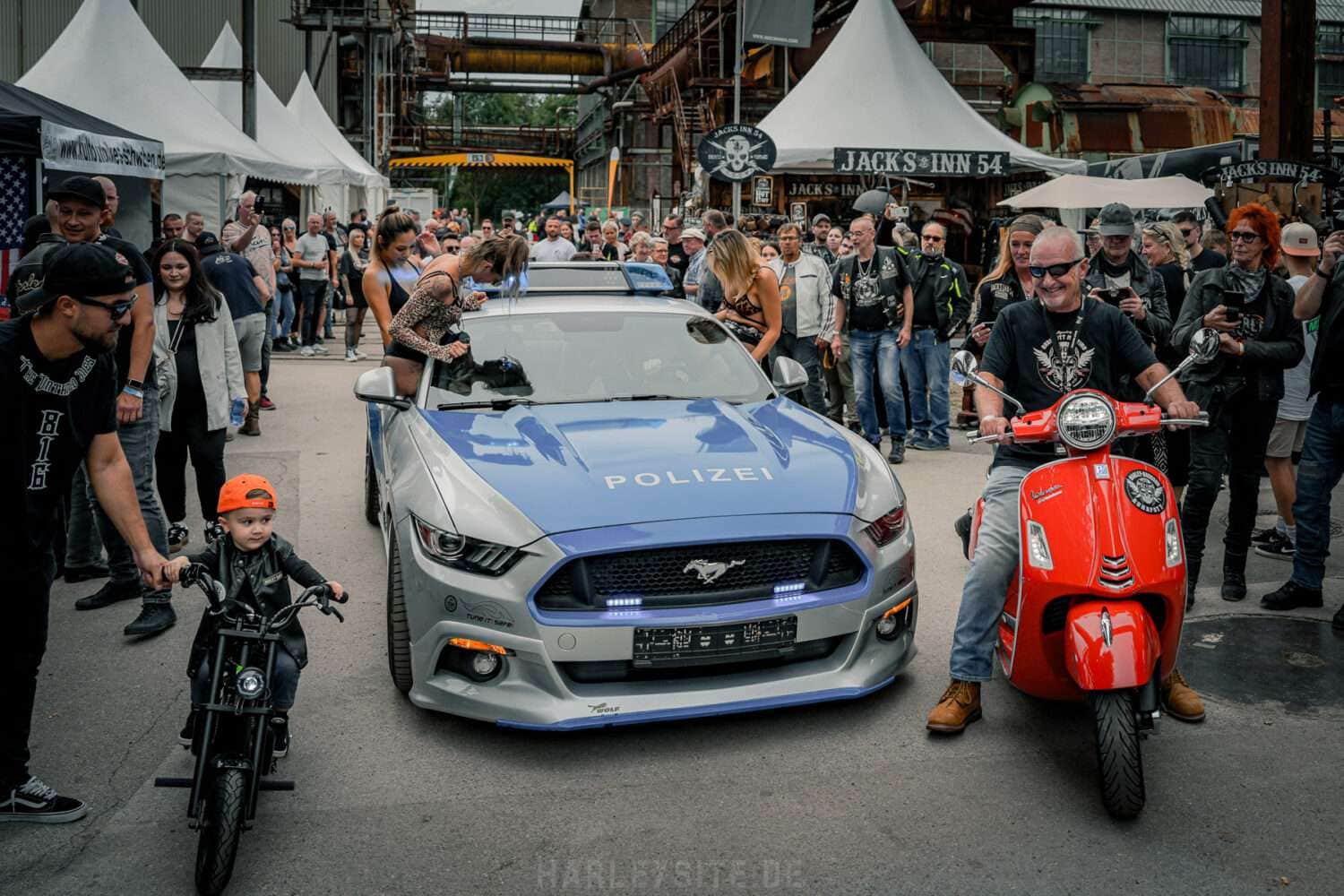 Organizer Klaus Fröhlich on his scooter