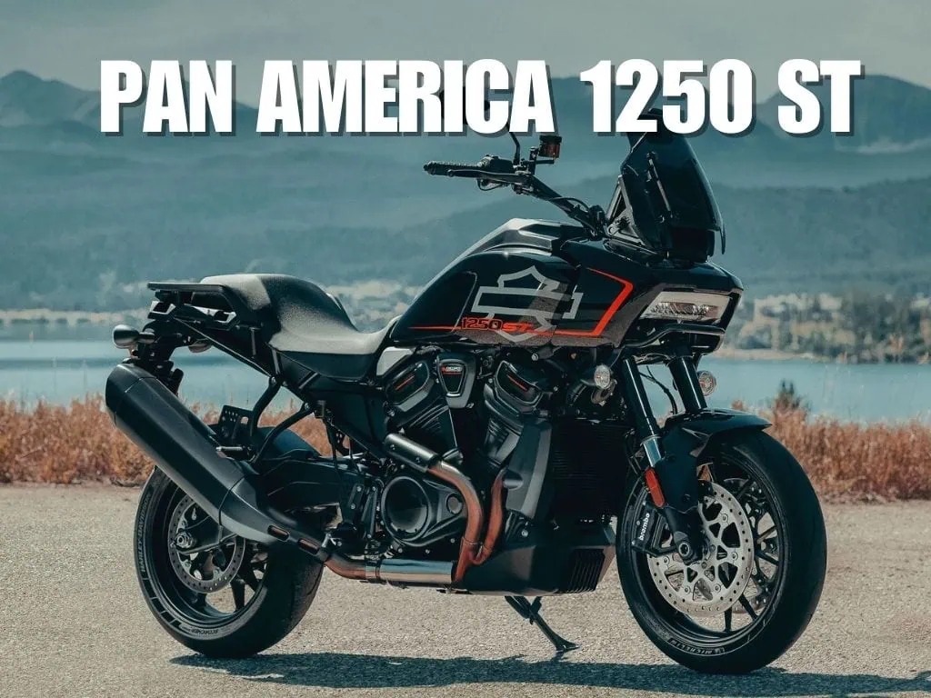 a black motorcycle parked on a road