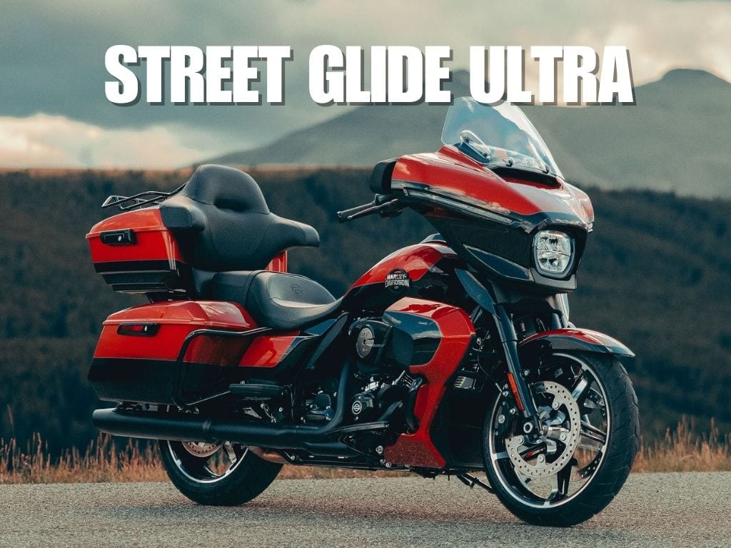 a red motorcycle parked on a road