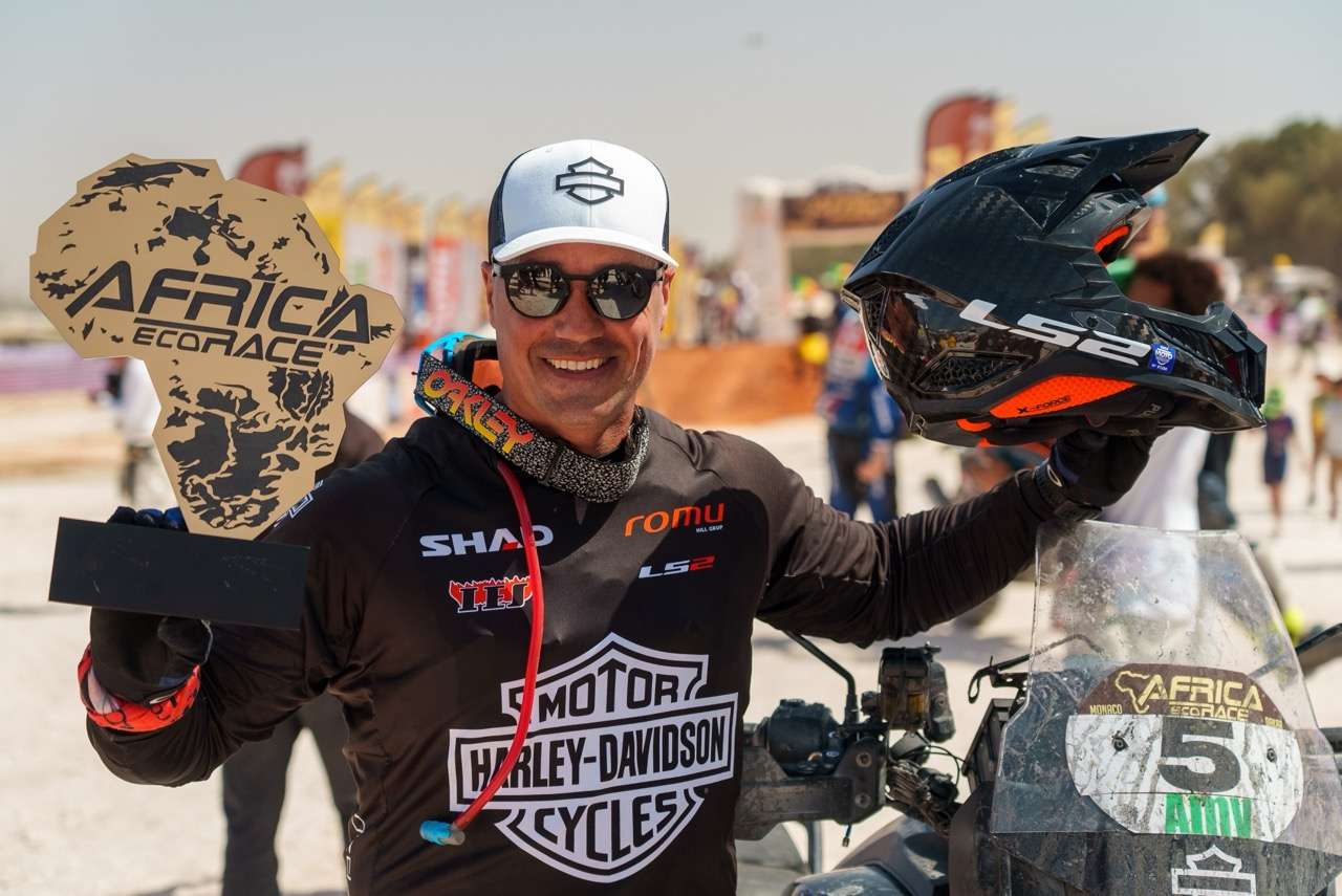 a man holding a helmet