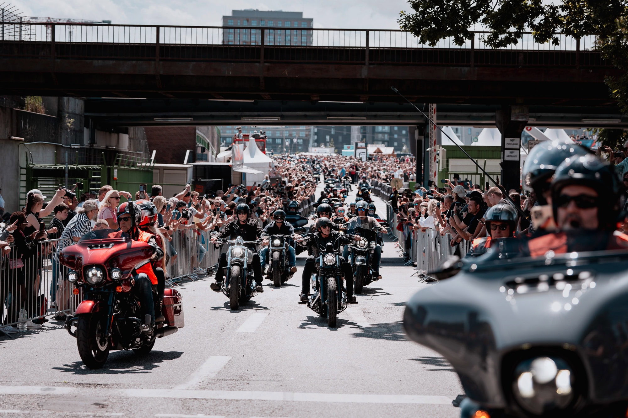 a group of people riding motorcycles